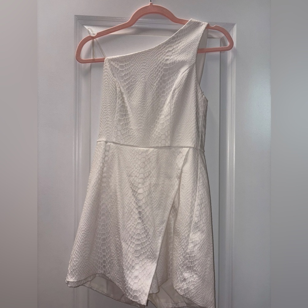Elegant White Textured One-Shoulder Romper